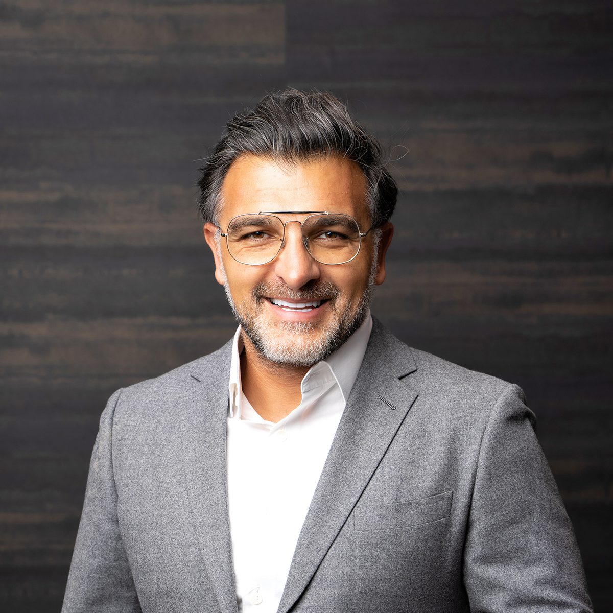 JOHN SANEI